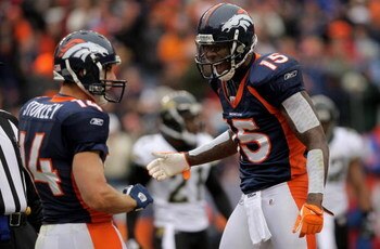 DENVER - OCTOBER 12:  Wide receiver Brandon Stokley #14 of the Denver Broncos celebrates his 11 yard touchdown reception with Brandon Marshall #15 against the Jacksonville Jaguars in the first quarter during NFL action on October 12, 2008 in Denver, Color