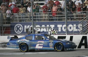 HAMPTON, GA - MARCH 08:  Kurt Busch driver of the #2 Miller Lite Dodge celebrates winning the NASCAR Sprint Cup Series Kobalt Tools 500 at the Atlanta Motor Speedway on March 8, 2009 in Hampton, Georgia.  (Photo by Jerry Markland/Getty Images for NASCAR)