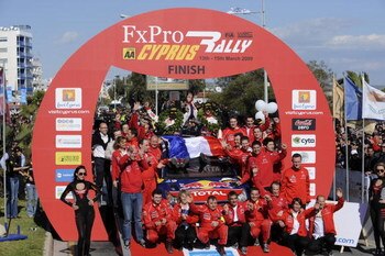 LIMASSOL, CYPRUS - MARCH 15:  Sebastien Loeb of France and Daniel Elena of Monaco with  the complete Citroen World Rally Team in the final cerimonial  of the WRC FxPro Rally of Cyprus 2009 on March 15, 2009 in Limassol, Cyprus.  (Photo by Massimo Bettiol/