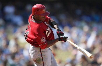 LOS ANGELES, CA - SEPTEMBER 07:   Justin Upton #10 of the Arizona Diamondbacks bats during the game against the Los Angeles Dodgers at Dodger Stadium on September 7, 2008 in Los Angeles, California. The Dodgers defeated the Diamondbacks 5-3.  (Photo by Li