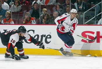 PHILADELPHIA - OCTOBER 1: Sergei Fedorov #91 of the Washington Capitals skates against Joffrey Lupul #15 of the Philadelphia Flyers at the Wachovia Center October 1, 2008 in Philadelphia, Pennsylvania. The Flyers defeated the Capitals 2-1. (Photo by Jim M