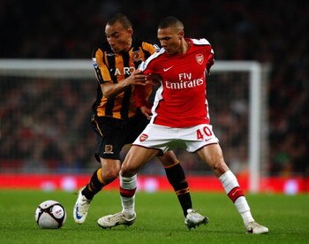 LONDON - MARCH 17:  Craig Fagan of Hull City challenges Kieran Gibbs of Arsenal during the the FA Cup Sponsored by E.on sixth round match between Arsenal and Hull City at Emirates Stadium on March 17, 2009 in London, England.  (Photo by Ryan Pierse/Getty 