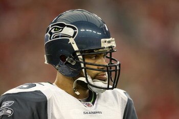 GLENDALE, AZ - DECEMBER 28:  Quarterback Seneca Wallace #15 of the Seattle Seahawks looks on during the game against the Arizona Cardinals on December 28, 2008 at University of Phoenix Stadium in Glendale, Arizona.  The Cardinals won 34-21.  (Photo by Ste
