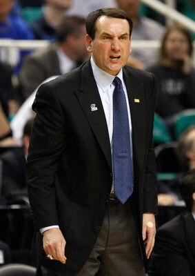 GREENSBORO, NC - MARCH 19:  Head coach Mike Krzyzewski of the Duke Blue Devils yells to his team against the Binghamton Bearcats during the first round of the NCAA Division I Men's Basketball Tournament at the Greensboro Coliseum on March 19, 2009 in Gree
