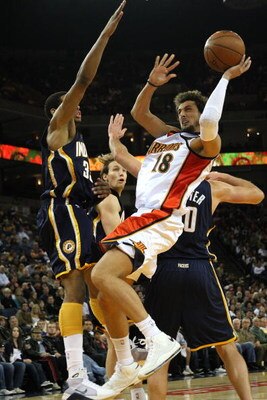 OAKLAND, CA - JANUARY 11:  Marco Belinelli #18 of the Golden State Warriors shoots over Danny Granger #33 of the Indiana Pacers during an NBA game on January 11, 2009 at Oracle Arena in Oakland, California. NOTE TO USER: User expressly acknowledges and ag