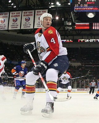 UNIONDALE, NY - JANUARY 31: Jay Bouwmeester #4  of the Florida Panthers defends against the New York Islanders on January 31, 2009 at Nassau Coliseum in Uniondale, New York. (Photo by Bruce Bennett/Getty Images)