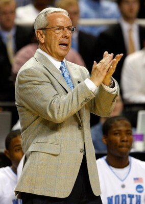 GREENSBORO, NC - MARCH 19:  Head coach Roy Williams of the North Carolina Tar Heels cheers on his team against the Radford Highlanders during the first round of the NCAA Division I Men's Basketball Tournament at the Greensboro Coliseum on March 19, 2009 i