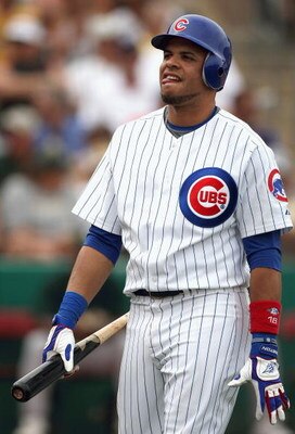 MESA, AZ - MARCH 03:  Aramis Ramirez #16 of the Chicago Cubs reacts after striking out against the Oakland Athletics during the spring training game at HoHoKam Park on March 3, 2009 in Mesa, Arizona. The Cubs defeated the A's 6-4.  (Photo by Christian Pet