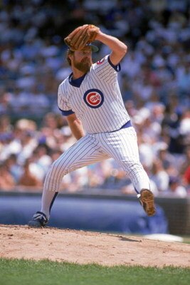 CHICAGO - 1989:  Rick Sutcliffe #40 of the Chicago Cubs winds back to pitch during a game in the 1989 season at Wrigley Field in Chicago, Illinois . ( Photo by: Jonathan Daniel/Getty Images )