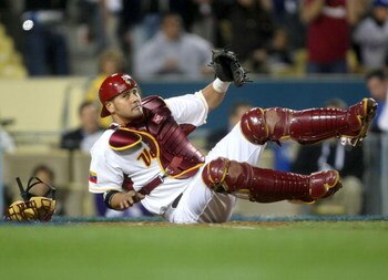 LOS ANGELES, CA - MARCH 21:  Catcher Ramon Hernandez #19 of Venezuela reacts after failing to tag out Tae Kyun Kim #52 of Korea in the sixth of the semifinal game of the 2009 World Baseball Classic on March 21, 2009 at Dodger Stadium in Los Angeles, Calif
