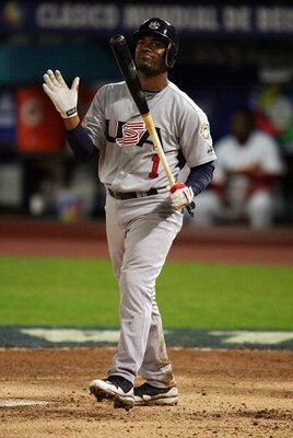 MIAMI - MARCH 18: Jimmy Rollins #1 of the United States reacts after striking out in the sixth inning against Venezuela during day 5 of round 2 of the World Baseball Classic at Dolphin Stadium on March 18, 2009 in Miami, Florida. Venezuela defeated the Un