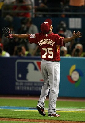 MIAMI - MARCH 16:  Closer Francisco Rodriguez #75 of Venezuela celebrates after finishing the eighth inning against Puerto Rico during day 3 of round 2 of the World Baseball Classic at Dolphin Stadium on March 16, 2009 in Miami, Florida. Venezuela defeate