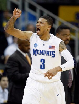 KANSAS CITY, MO - MARCH 19:  Roburt Sallie #3 of the Memphis Tigers reacts after making a three-point shot in the first half against the CSUN Matadors during the first round of the NCAA Division I Men's Basketball Tournament at the Sprint Center on March 