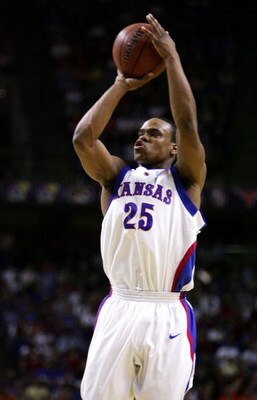 KANSAS CITY, MO - MARCH 12:  Michael Lee #25 of the Kansas Jayhawks shoots a jumper in the first half against the Oklahoma State Cowboys in the Semifinals of the Phillips 66 Big 12 Men's Basketball Tournament at Kemper Arena on March 12, 2005 in Kansas Ci