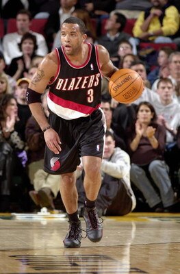 SEATTLE - NOVEMBER 7:  Damon Stoudamire #3 of the Portland Trail Blazers pushes the ball up court during the game against the Seattle Sonics in Key Arena on November 7, 2003 in Seattle, Washington.  The Sonics won 100-82.  NOTE TO USER: User expressly ack