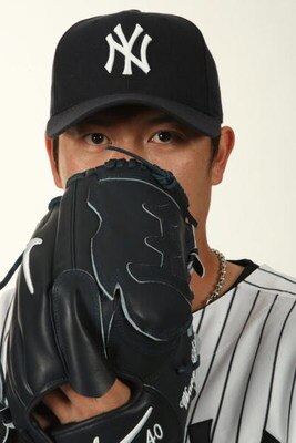 TAMPA, FL - FEBRUARY 19:  Chien-Ming Wang #40 of the New York Yankees poses during Photo Day on February 19, 2009 at Legends Field in Tampa, Florida. (Photo by Nick Laham/Getty Images)
