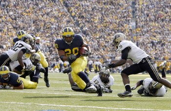 ANN ARBOR, MI - OCTOBER 13: Mike Hart #20 of the Michigan Wolverines carries the ball during the game against the Purdue Boilermakers on October 13, 2007 at Michigan Stadium in Ann Arbor, Michigan. (Photo By Gregory Shamus/Getty Images)  
