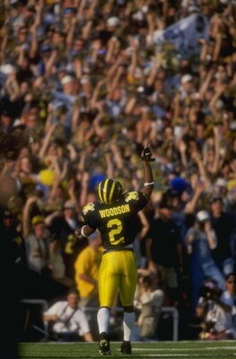 1 Jan 1998:  Charles Woodson #2 of Michigan celebrates during a game against Washington State at Rose Bowl in Pasadena, California.  Michigan defeated Washington State 21-16. Mandatory Credit: Jed Jacobsohn  /Allsport