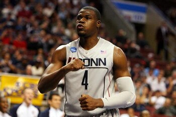 PHILADELPHIA - MARCH 19:  Jeff Adrien #4 of the Connecticut Huskies reacts during the game against the Chattanooga Mocs during the first round of the NCAA Division I Men's Basketball Tournament at the Wachovia Center on March 19, 2009 in Philadelphia, Pen
