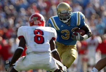 PASADENA, CA - SEPTEMBER 27:  Derrick Coleman #33 of the UCLA Bruins goes up against Sharrod Davis #8 of the Frenso State Bulldogs during the game on September 27, 2008 at the Rose Bowl in Pasadena, California.  (Photo by Stephen Dunn/Getty Images)