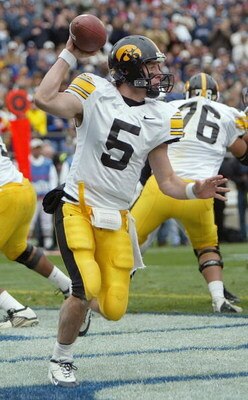 STATE COLLEGE, PA - OCTOBER 23:  Quarterback Drew Tate #5 of the Iowa Hawkeyes looks to pass against the Penn State Nittany Lions during the game at Beaver Stadium on October 23, 2004 in State College, Pennsylvania.  The Hawkeyes defeated the Nittany Lion