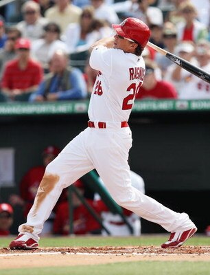 JUPITER, FL - FEBRUARY 25:  Colby Rasmus #28 of the St. Louis Cardinals bats against the Florida Marlins during a spring training game at Roger Dean Stadium on February 25, 2009 in Jupiter, Florida. The Marlins and the Mets played to a 5-5 tie in 10 innin