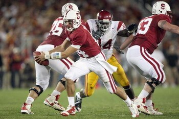 STANFORD - NOVEMBER 15:  Quarterback Tavita Pritchard #14 of Stanford Cardinals moves to hand off the ball during the game against the USC Trojans at Stanford Stadium on November 15, 2008 in Stanford, California. (Photo by: Jed Jacobsohn/Getty Images)
