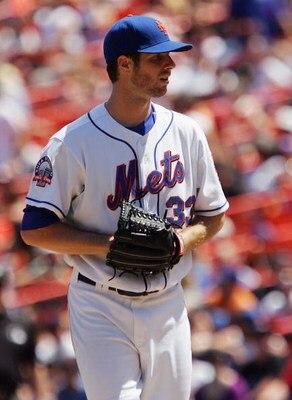 NEW YORK - JULY 10: John Maine #33 of the New York Mets pitches against the San Francisco Giants on July 10, 2008 at Shea Stadium in the Flushing neighborhood of the Queens borough of New York City. The Mets defeated the Giants 7-3. (Photo by Jim McIsaac/