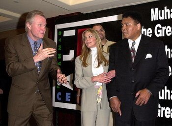 381869 05: Boxing legend Muhammad Ali, right, watches actor Jon Voight's boxing imitation as Bo Derek and Sinbad look on during 'Roast This! An Evening With Muhammad Ali and Friends' celebrity roast November 16, 2000 in Los Angeles, CA. The event benefitt
