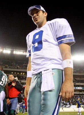 PHILADELPHIA - DECEMBER 28:  Tony Romo #9 of the Dallas Cowboys walks off the field after playing the Philadelphia Eagles on December 28, 2008 at Lincoln Financial Field in Philadelphia, Pennsylvania. The Eagles defeated the Cowboys 44-6.  (Photo by Jim M