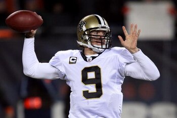 CHICAGO - DECEMBER 11:  Drew Brees #9 of the New Orleans Saints throws a pass against the Chicago Bears at Soldier Field on December 11, 2008 in Chicago, Illinois.  (Photo by Jonathan Daniel/Getty Images)