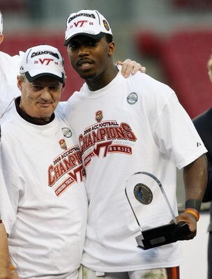 TAMPA, FL - DECEMBER 06:  Head coach Frank Beamer and quarterback Tyrod Taylor #5 of the Virginia Tech Hokies celebrate on the podium after defeating the Boston College Eagles in the 2008 ACC Football Championship game at the Raymond James Stadium on Dece