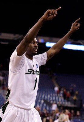 INDIANAPOLIS - MARCH 27:  Kalin Lucas #1 of the Michigan State Spartans reacts after Michigan State's 67-62 against the Kansas Jayhawks during the third round of the NCAA Division I Men's Basketball Tournament at the Lucas Oil Stadium on March 27, 2009 in