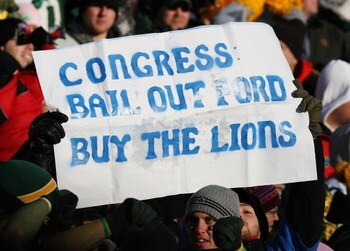 GREEN BAY, WI - DECEMBER 28: Fans hold a sign during a game between the Green Bay Packers and the Detroit Lions on December 28, 2008 at Lambeau Field in Green Bay, Wisconsin. The Packers defeated the Lions 31-21. (Photo by Jonathan Daniel/Getty Images)