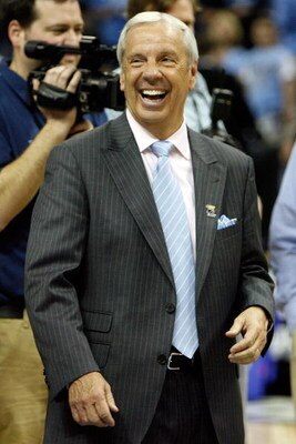 MEMPHIS, TN - MARCH 29:  Head coach Roy Williams of the North Carolina Tar Heels celebrates after defeating the Oklahoma Sooners during the NCAA Men's Basketball Tournament South Regional Final at the FedExForum on March 29, 2009 in Memphis, Tennessee. Th