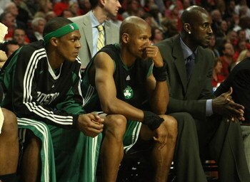 CHICAGO - APRIL 30: Rajon Rondo #9, Ray Allen #20 and Kevin Garnett of the Boston Celtics watch from the bench in Game Six of the Eastern Conference Quarterfinals during the 2009 NBA Playoffs against the Chicago Bulls at the United Center on April 30, 200