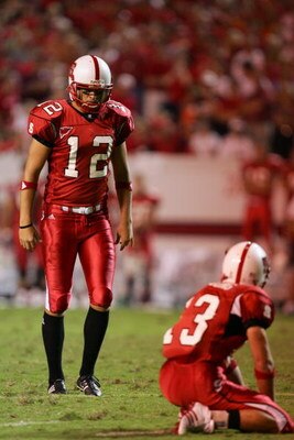 RALEIGH, NC - SEPTEMBER 4:  Holder Chris Young #13 of the North Carolina State University Wolfpack and punter John Deraney #12 prepare for the kick during the game against the Virginia Polytechnic Institute and State University Hokies at Carter-Finley Sta