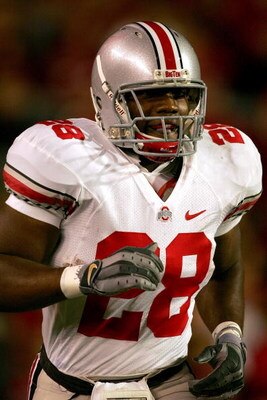 MADISON, WI - OCTOBER 04:  Chris Wells #28 of the Ohio State Buckeyes celebrates after scoring a touchdown against the Wisconsin Badgers at Camp Randall Stadium  October 4, 2008 in Madison, Wisconsin.  (Photo by Matthew Stockman/Getty Images)