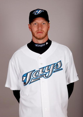 DUNEDIN, FL - FEBRUARY 23: Roy Halladay #32 of the Toronto Blue Jays poses during photo day at the Bobby Mattick Training Center at Englebert Complex on February 23, 2009 in Dunedin, Florida. (Photo by J. Meric/Getty Images)