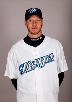 DUNEDIN, FL - FEBRUARY 23:  Roy Halladay #32 of the Toronto Blue Jays poses during photo day at the Bobby Mattick Training Center at Englebert Complex on February 23, 2009 in Dunedin, Florida.  (Photo by J. Meric/Getty Images)