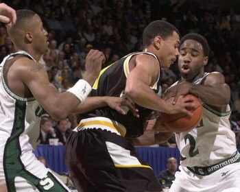 16 Mar 2000:  Mateen Cleeves #12 of Michigan State University tries to steal the ball from Milo Stovall #11 of Valparaiso University during the first round of the NCAA Tournament Midwest Regionals at the Goodman Arena at Cleveland State University Convoca