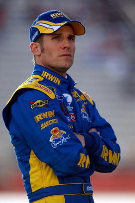 ATLANTA - MARCH 06:  Jamie McMurray, driver of the #26 Irwin Industrial Tools Ford walks along pit road before qualifying for the NASCAR Sprint Cup Series Kobalt Tools 500 at the Atlanta Motor Speedway on March 6, 2009 in Hampton, Georgia.  (Photo by Chri
