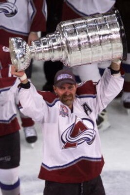9 Jun 2001: Ray Bourque #77 of the Colorado Avalanche hoists the Stanley Cup after defeating the New Jersey Devils during the Stanley Cup finals at the Pepsi Center in Denver, Colorado. The Avalanche defeated the Devils 3-1 to win the series 4-3. DIGITAL 