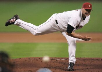 HOUSTON - OCTOBER 15:  Starting pitcher Roger Clemens #22 of the Houston Astros throws a pitch against the St. Louis Cardinals during Game Three of the National League Championship Series at Minute Maid Park on October 15, 2005 in Houston, Texas.  (Photo 