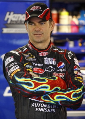 MARTINSVILLE, VA - MARCH 28: Jeff Gordon, driver of the #24 DuPont Chevrolet, stands in the garage as it rains during practice for the NASCAR Sprint Cup Series Goody's Fast Pain Relief 500 at the Martinsville Speedway on March 28, 2009 in Martinsville, Vi
