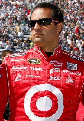 MARTINSVILLE, VA - MARCH 29: Juan Pablo Montoya, driver of the #42 Target Chevrolet, stands on the grid prior to the start of the NASCAR Sprint Cup Series Goody's Fast Pain Relief 500 at the Martinsville Speedway on March 29, 2009 in Martinsville, Virgini