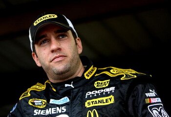 MARTINSVILLE, VA - MARCH 28: Elliott Sadler, driver of the #19 Stanley Tools Dodge, stands in the garage area as practice rains out for the NASCAR Sprint Cup Series Goody's Fast Pain Relief 500 at the Martinsville Speedway on March 28, 2009 in Martinsvill