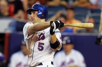 NEW YORK - AUGUST 06:  David Wright #5 of the New York Mets connects in the fifth inning against the San Diego Padres on August 6, 2008 at Shea Stadium in the Flushing neighborhood of the Queens borough of New York City.  (Photo by Jim McIsaac/Getty Image