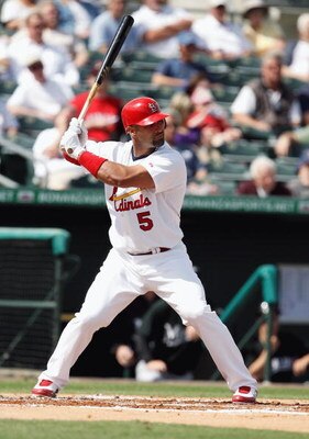 JUPITER, FL - FEBRUARY 25:  Albert Pujols #5 of the St. Louis Cardinals bats against the Florida Marlins during a spring training game at Roger Dean Stadium on February 25, 2009 in Jupiter, Florida. The Marlins and the Mets played to a 5-5 tie in 10 innin