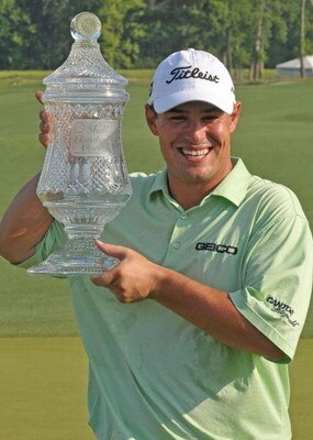 HUMBLE, TX - APRIL 06:  Johnson Wagner holds the winners trophy after winning  the final round of the Shell Houston Open at Redstone Golf Club April 6, 2008 in Humble, Texas.  (Photo by Marc Feldman/Getty Images)